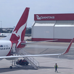 Qantas leaps to record H1 profit but fare moderation spooks investors |  Reuters